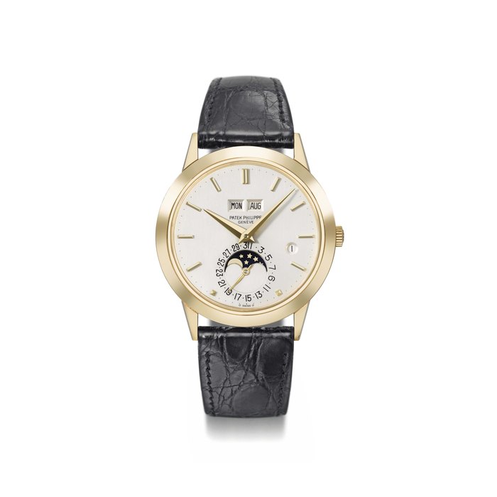 Patek Philippe. An exceptionally fine and rare 18K gold automatic perpetual calendar wristwatch with moon phases, Roman leap year indicator, original certificate and sales tag Signed Patek Philippe, Genève, ref. 3450, movement no. 1'119'776, case no. 2’808’554, manufactured in 1985