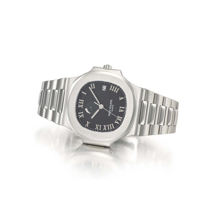 Patek Philippe. A rare and highly unusual stainless steel automatic wristwatch with sweep centre seconds, date, power reserve, bracelet, box and “lucky XIII” dial Signed Patek Philippe, Genève, ref. 3710/1A, movement no. 3’148’081, case no. 4’050’566, manufactured in 1998