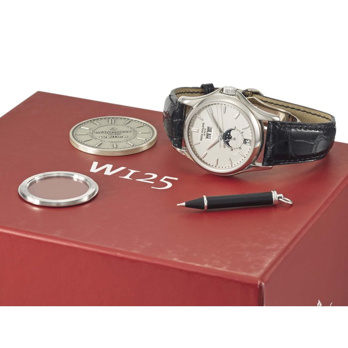 Patek Philippe. A very fine and rare 18K white gold annual calendar limited edition automatic wristwatch with sweep centre seconds, 24 hours indication, moon phases, original certificate, second case back and box, made for the 125th anniversary for Wempe Signed Patek Philippe, Genève, made for and retailed by Wempe, ref. 5125, W125, movement no. 3’360’289, case no. 4’213’404, made in 2003