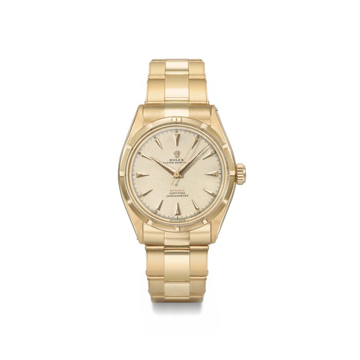Rolex. A fine, very rare and highly attractive 18K pink gold automatic wristwatch with sweep centre seconds, honeycomb luminous dial and bracelet Signed Rolex, Oyster Perpetual, ref. 6285, case no. 938’154, circa 1953