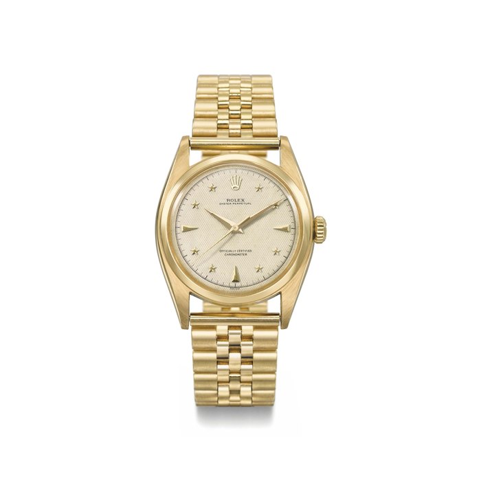 Rolex. A highly attractive and extremely rare 18K gold automatic sweep centre seconds wristwatch with luminous honeycomb star dial, gilt movement and bracelet Signed Rolex Oyster Perpetual, Officially Certified Chronometer, ref. 6098, movement no. 53659, case no. 912019, manufactured in 1953