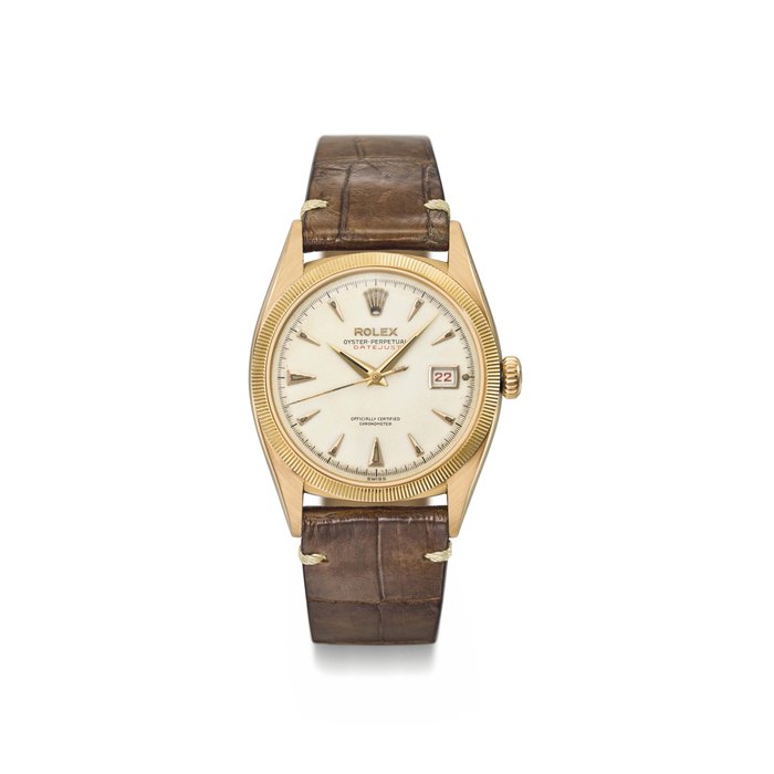 Rolex. An extremely rare and attractive 18K pink gold automatic wristwatch with centre seconds and red date Signed Rolex, Oyster Perpetual, Datejust, ref. 6305, case no. 948’427, circa 1953