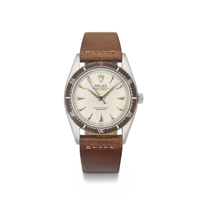 Rolex. A very rare and attractive stainless steel automatic wristwatch with sweep centre seconds, and white honeycomb dial. Made for the English Hydrographic Service Signed Rolex, Oyster perpetual, Turn-o-Graph, ref. 6202, case no. 949’999, circa 1953