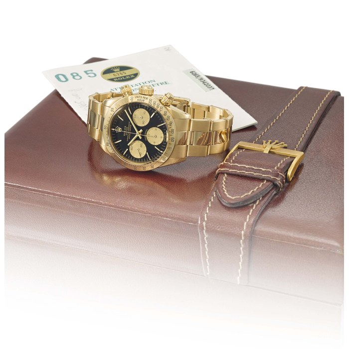 Rolex. A rare and very fine 18K gold chronograph wristwatch with bracelet, box and original guarantee Signed Rolex, Oyster, Cosmograph, ref. 6265, case No. 9'342'037, circa 1986