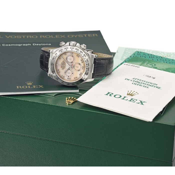 Rolex. A fine 18K white gold and mother of pearl automatic chronograph wristwatch with Guarantee and box Signed Rolex, Oyster Perpetual, Cosmograph Daytona, ref. 116519, case no. P623500, manufactured in 2000