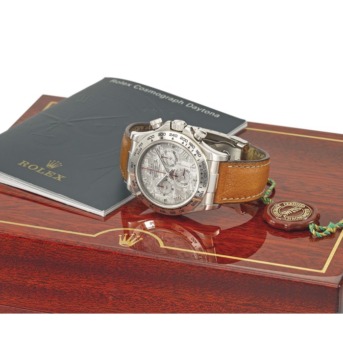 Rolex. An 18K white gold automatic chronograph wristwatch with meteorite dial, box and certificate Signed Rolex, Oyster Perpetual, Cosmograph Daytona, Ref. 116519, case no. K878647, manufactured in 2001