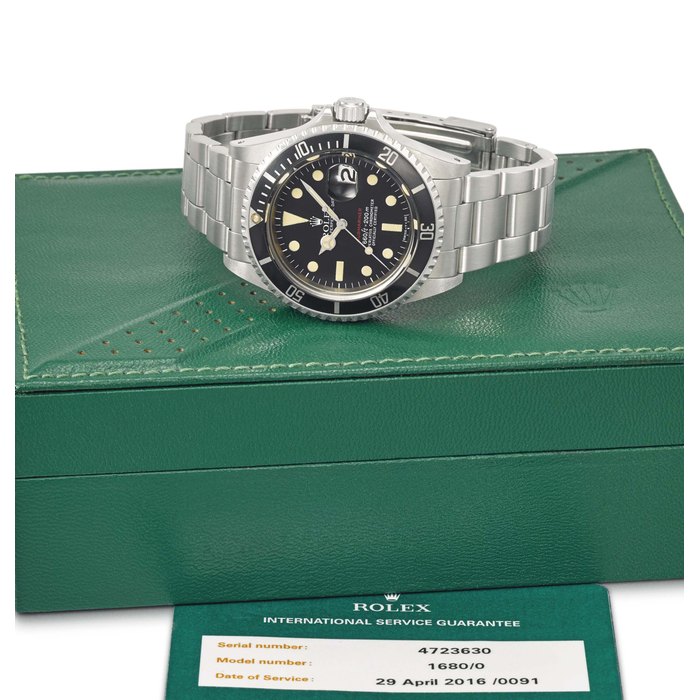 Rolex. A stainless steel automatic diver’s wristwatch with sweep centre seconds and date Signed Rolex, Oyster Perpetual date, Submariner, 660ft = 200m, ref. 1680, case no. 4’723’630, circa 1974