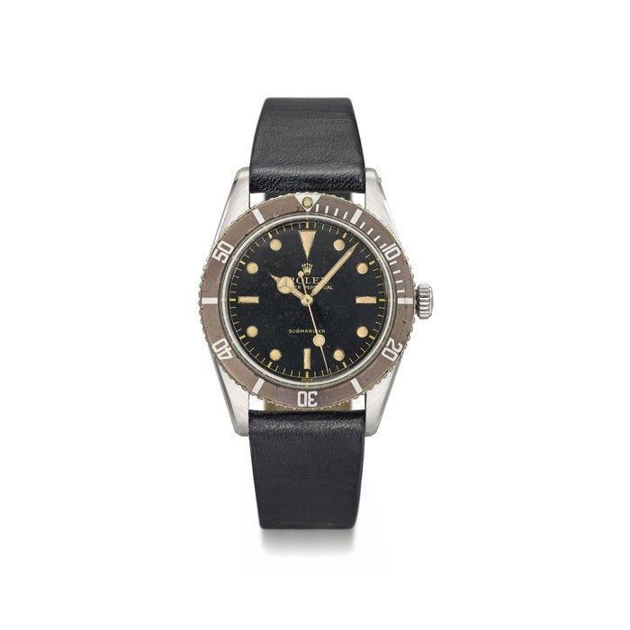 Rolex. A fine and very rare stainless steel automatic wristwatch with sweep centre seconds and tropical bezel Signed Rolex, Oyster Perpetual, Submariner, ref. 6205, case no. 21’488, circa 1954