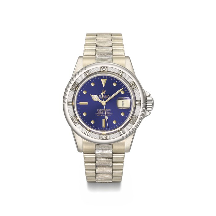 Rolex. A fine and very important 18K white gold automatic wristwatch with sweep centre seconds, nipple dial, date and 18K white gold bracelet Signed Rolex, Oyster Perpetual, Submariner, 660ft=200m, ref. 1680, without serial number, circa 1973