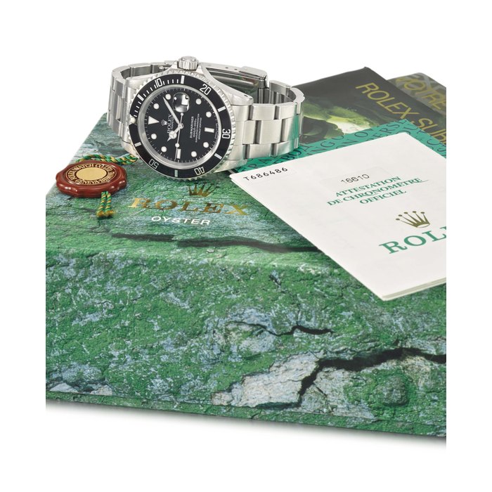 Rolex. A fine and extremely rare stainless steel automatic wristwatch with sweep centre seconds, date, engraved case back, bracelet, “Operation Everest” documentation, box and Guarantee. Made for the Comex “Operation Everest” experiment Signed Rolex, Oyster Perpetual Date, Submariner, 1000ft = 300m, ref. 16610, case no. T686486, circa 1997