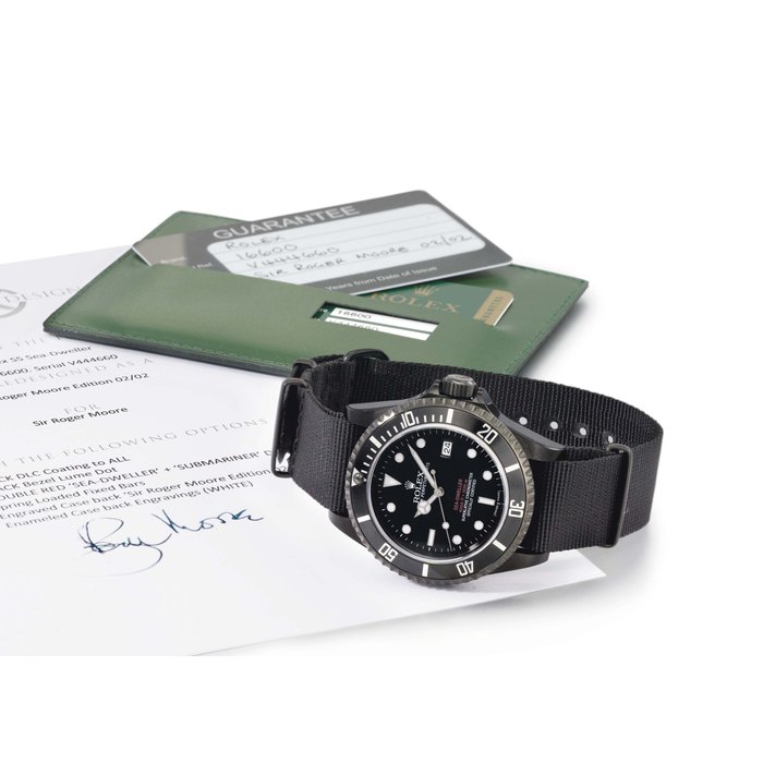 Project X Designs. A very rare black DLC coated stainless steel limited edition automatic diver's wristwatch with gas escape valve, sweep centre seconds, date, hack feature, black dial with double red "Sea-Dweller 4000ft=1220m" printing, limited edition certificate, original envelope, guarantees, sales tags and presentation box Signed Rolex, Oyster Perpetual Date, Sea-Dweller, 4000ft=1220m, Superlative Chronometer, Officially Certified, ref. 16600, case no. V444660, Project x Designs Sir Roger M