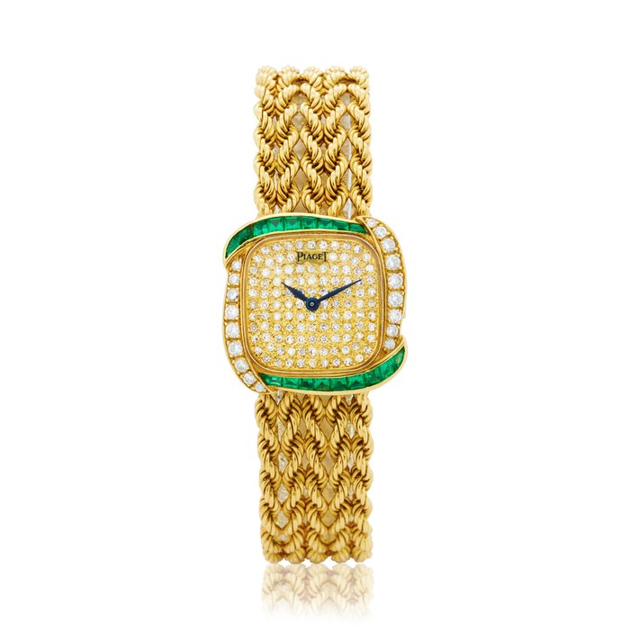 PIAGET LADY’S DIAMOND AND EMERALD-SET BRACELET WATCH