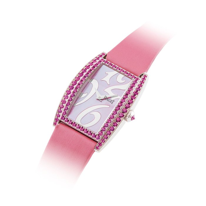PIAGET. A LADY ’ S 18K WHITE GOLD AND PINK SAPPHIRE-SET TONNEAU-SHAPED WRISTWATCH WITH PINK MOTHER-OF-PEARL DIAL SIGNED PIAGET, LIMELIGHT TONNEAU MODEL, REF. PI0266, CASE NO. 946’084, CIRCA 2010