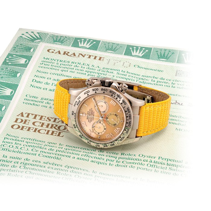 ROLEX. A FINE 18K WHITE GOLD AUTOMATIC CHRONOGRAPH WRISTWATCH WITH YELLOW MOTHER-OF-PEARL DIAL SIGNED ROLEX, OYSTER PERPETUAL, COSMOGRAPH DAYTONA, BEACH MODEL, REF. 116519, CASE NO. P840946, CIRCA 2000
