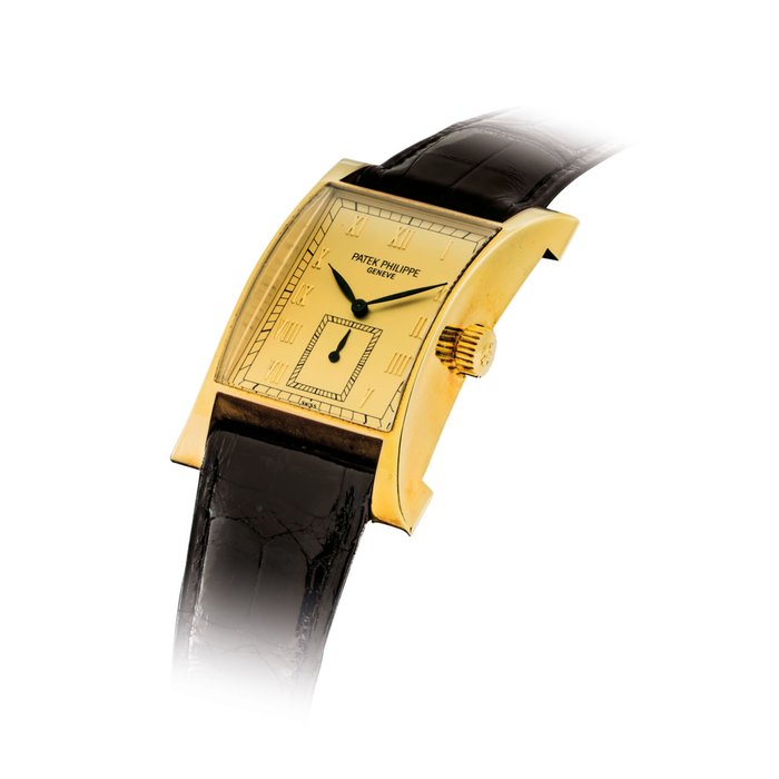 PATEK PHILIPPE. A FINE 18K GOLD LIMITED EDITION RECTANGULAR WRISTWATCH WITH ORIGINAL CERTIFICATE AND BOX, MADE TO COMMEMORATE THE OPENING OF PATEK PHILIPPE'S WATCHMAKING CENTRE IN GENEVA IN 1997 SIGNED PATEK PHILIPPE, GENEVE, PAGODA MODEL, REF. 5500J, MOVEMENT NO. 1’858’421, CASE NO. 4’013’334, MANUFACTURED IN 1997
