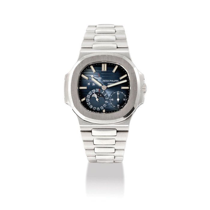 PATEK PHILIPPE. A FINE STAINLESS STEEL AUTOMATIC WRISTWATCH WITH POWER RESERVE, MOON PHASES, DATE, ORIGINAL CERTIFICATE AND BOX SIGNED PATEK PHILIPPE, GENEVE, NAUTILUS MODEL, REF. 5712/1A, MOVEMENT NO. 3’173’889, CASE NO. 4’376’097, CIRCA 2007