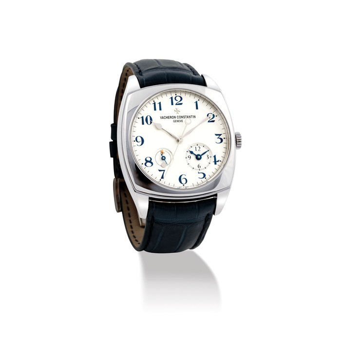 VACHERON CONSTANTIN. A FINE AND RARE 18K WHITE GOLD LIMITED EDITION CUSHION-SHAPED AUTOMATIC DUAL TIME WRISTWATCH WITH SWEEP CENTRE SECONDS AND DAY AND NIGHT INDICATION, MADE TO COMMEMORATE THE 260TH ANNIVERSARY OF VACHERON CONSTANTIN SIGNED VACHERON CONSTANTIN, GENEVE, HARMONY DUAL TIME MODEL, REF. 7810S/000G-B050, MOVEMENT NO. 5'337'758, CASE NO. 1'318'272, CIRCA 2015