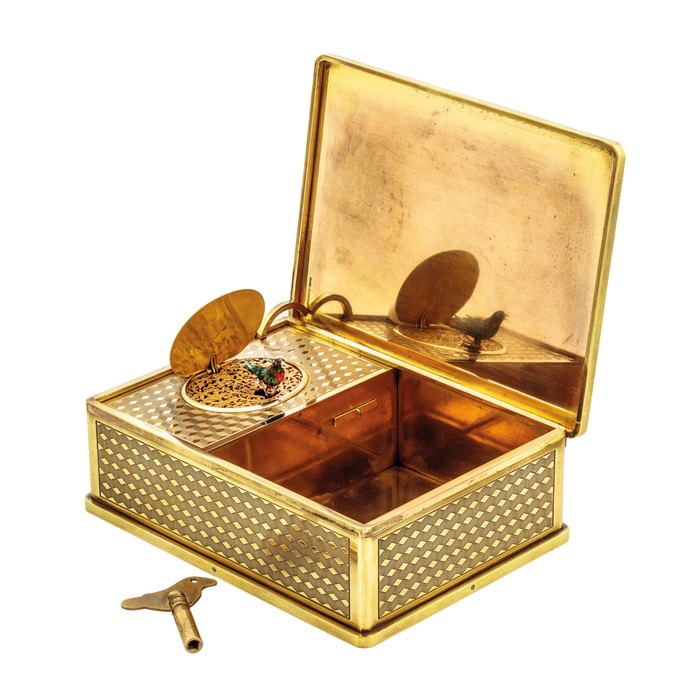 BREGUET. A RARE AND UNUSUAL GILT METAL SINGING BIRD BOX SIGNED BREGUET, CASE NO. 3361, MANUFACTURED IN 1935 AND SOLD TO MR. ARNOUX ON 31 DECEMBER 1935