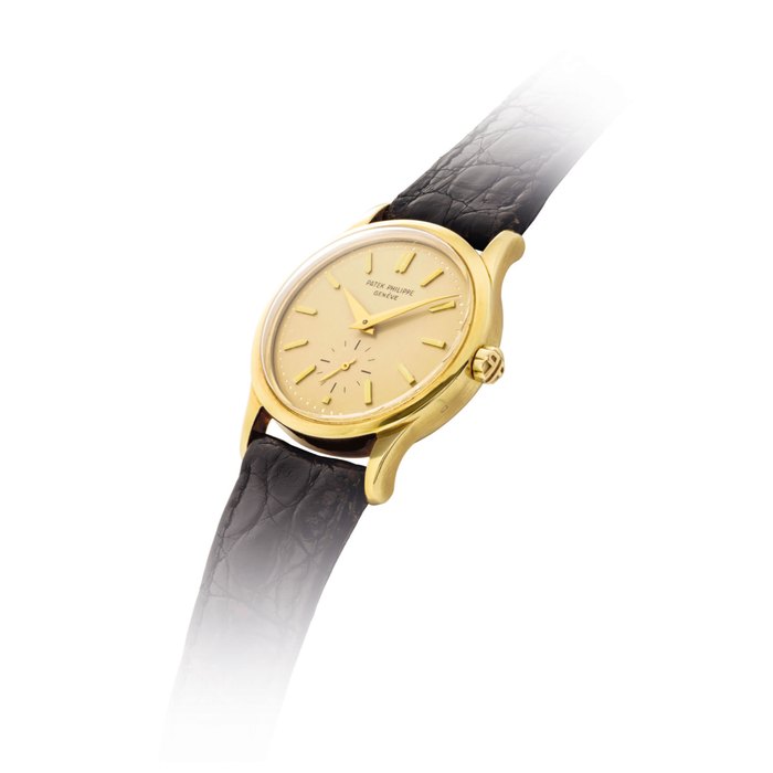 PATEK PHILIPPE. A FINE AND RARE 18K GOLD AUTOMATIC WRISTWATCH WITH GILT DIAL SIGNED PATEK PHILIPPE, GENEVE, CALATRAVA, REF. 3403, MOVEMENT NO. 765’729, CASE NO. 310’054, MANUFACTURED IN 1958