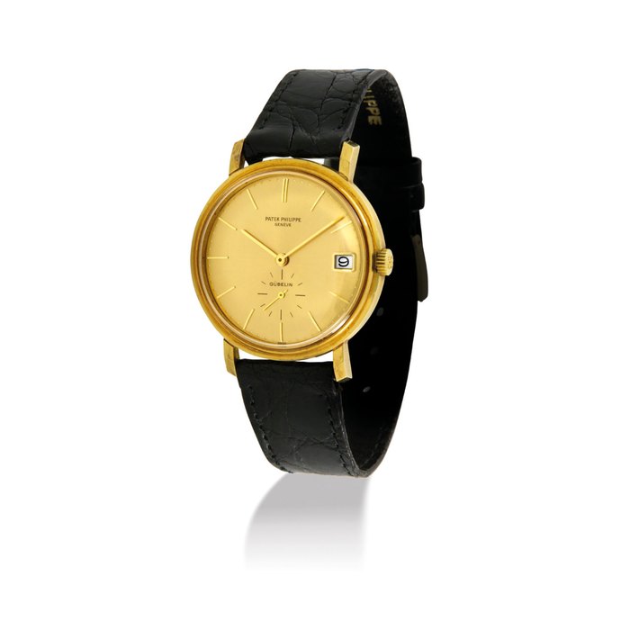 PATEK PHILIPPE. A FINE AND RARE 18K GOLD AUTOMATIC WRISTWATCH WITH DATE, GILT DIAL, ORIGINAL CERTIFICATE AND BOX SIGNED PATEK PHILIPPE, GENEVE, RETAILED BY GÜBELIN, REF. 3445, MOVEMENT NO. 1’231’961, CASE NO. 331’913, MANUFACTURED IN 1972
