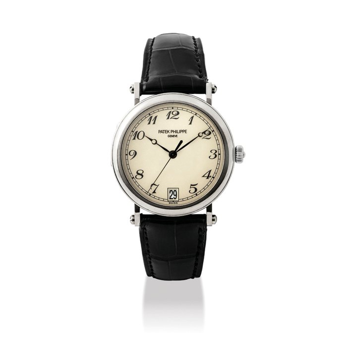 PATEK PHILIPPE. A FINE 18K WHITE GOLD AUTOMATIC WRISTWATCH WITH SWEEP CENTRE SECONDS, DATE, BREGUET NUMERALS, ORIGINAL CERTIFICATE AND BOX SIGNED PATEK PHILIPPE, GENEVE, REF. 5053G, MOVEMENT NO. 3’326’580, CASE NO. 4'159'675, MANUFACTURED IN 2001