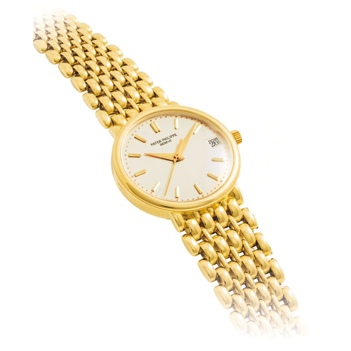 PATEK PHILIPPE. A FINE 18K GOLD AUTOMATIC WRISTWATCH WITH SWEEP CENTRE SECONDS, DATE AND BRACELET SIGNED PATEK PHILIPPE, GENEVE, CALATRAVA MODEL, REF. 3998/1, MOVEMENT NO. 1’914’542, CASE NO. 2’938’660, MANUFACTURED IN 1994