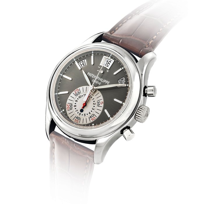PATEK PHILIPPE. A FINE PLATINUM AUTOMATIC ANNUAL CALENDAR CHRONOGRAPH WRISTWATCH WITH DAY AND NIGHT INDICATION, POWER RESERVE, ORIGINAL CERTIFICATE AND BOX SIGNED PATEK PHILIPPE, GENEVE, REF. 5960P, MOVEMENT NO. 3’504’469, CASE NO. 4'453'566, MANUFACTURED IN 2008
