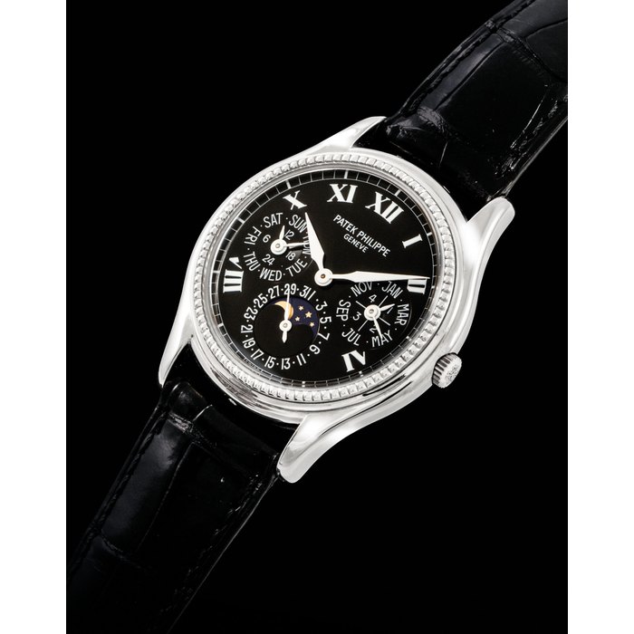 PATEK PHILIPPE. A FINE AND RARE 18K WHITE GOLD LIMITED EDITION AUTOMATIC PERPETUAL CALENDAR WRISTWATCH WITH MOON PHASES, LEAP YEAR , 24 HOUR INDICATION, ORIGINAL CERTIFICATE AND BOX SIGNED PATEK PHILIPPE, GENEVE, REF. 5038G, MOVEMENT NO. 775'924, CASE NO. 4'004'848, MANUFACTURED IN 1996