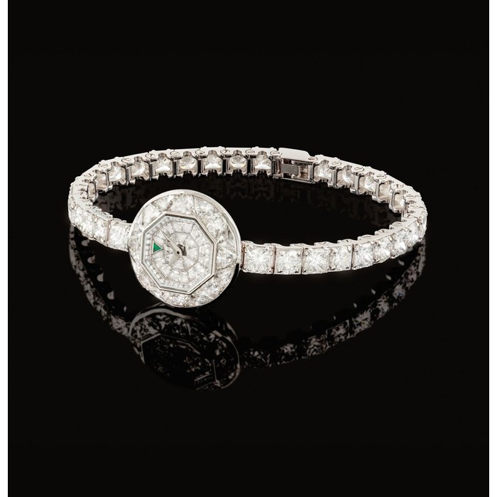 GRAFF. A LADY ’ S IMPRESSIVE AND RARE 18K WHITE GOLD, DIAMOND AND EMERALD-SET LIMITED EDITION WRISTWATCH WITH BRACELET SIGNED GRAFF, BABYGRAFF MODEL, NO. 001/100, CIRCA 2009
