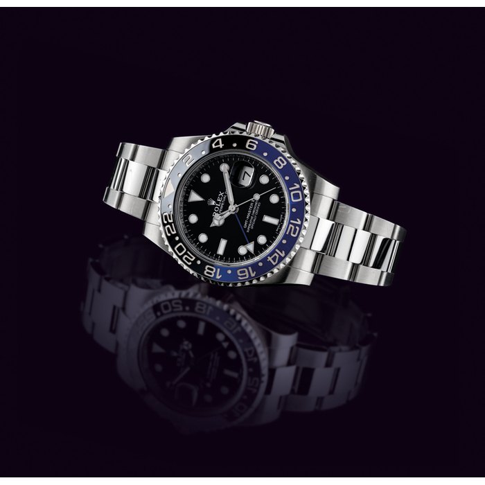 ROLEX. A STAINLESS STEEL AUTOMATIC DUAL TIME WRISTWATCH WITH SWEEP CENTRE SECONDS, DATE, BRACELET AND CERAMIC BEZEL SIGNED ROLEX, OYSTER PERPETUAL DATE, GMT-MASTER, REF.116710BLNR, CASE NO. 01H50421, CIRCA 2016