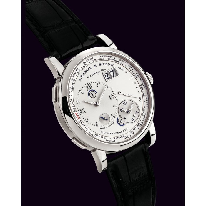 A. LANGE & SÖ HNE. A FINE 18K WHITE GOLD DUAL AND WORLD TIME WRISTWATCH WITH DATE, POWER RESERVE, DAY AND NIGHT INDICATION AND HACK FEATURE SIGNED A. LANGE & SÖHNE, GLASHÜTTE I/SA, LANGE 1 TIME ZONE MODEL, MOVEMENT NO. 92’132, CASE NO. 203’978, CIRCA 2006