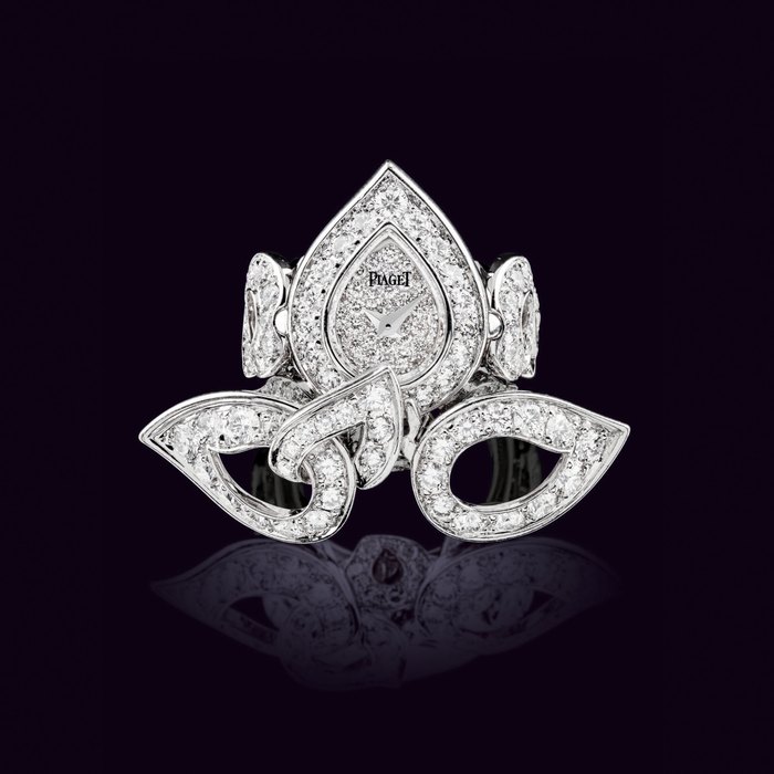PIAGET. A LADY ’ S HIGHLY ATTRACTIVE AND RARE 18K WHITE GOLD AND DIAMOND-SET RING WATCH SIGNED PIAGET, LIMELIGHT MODEL, REF. P10049, CASE NO. 905051, CIRCA 2013