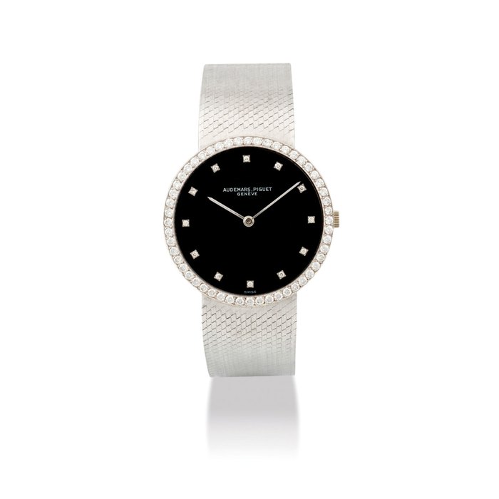 AUDEMARS PIGUET. AN ELEGANT 18K WHITE GOLD AND DIAMOND-SET BRACELET WATCH SIGNED AUDEMARS PIGUET, CASE NO. 75’449, CIRCA 1971