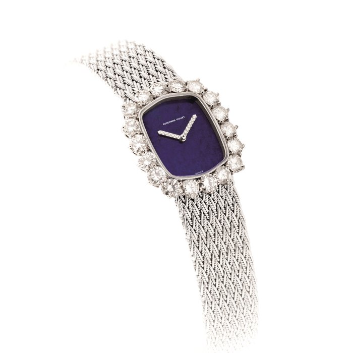 AUDEMARS PIGUET. A LADY ’ S FINE AND ATTRACTIVE 18K WHITE GOLD AND DIAMOND-SET RECTANGULAR BRACELET WATCH WITH LAPIS LAZULI DIAL SIGNED AUDEMARS PIGUET, CASE NO. 84’523, CIRCA 1970