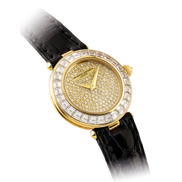 VACHERON CONSTANTIN. A LADY ’ S ATTRACTIVE 18K GOLD AND DIAMOND-SET WRISTWATCH SIGNED VACHERON CONSTANTIN, GENEVE, CASE NO. 653’779, CIRCA 1995