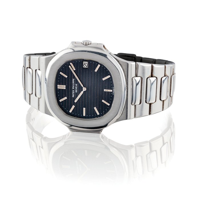 PATEK PHILIPPE. A FINE STAINLESS STEEL AUTOMATIC WRISTWATCH WITH DATE AND BRACELET SIGNED PATEK PHILIPPE, GENEVE, REF. 3700/1, MOVEMENT NO. 1'303'756, CASE NO. 539'266, MANUFACTURED IN 1977