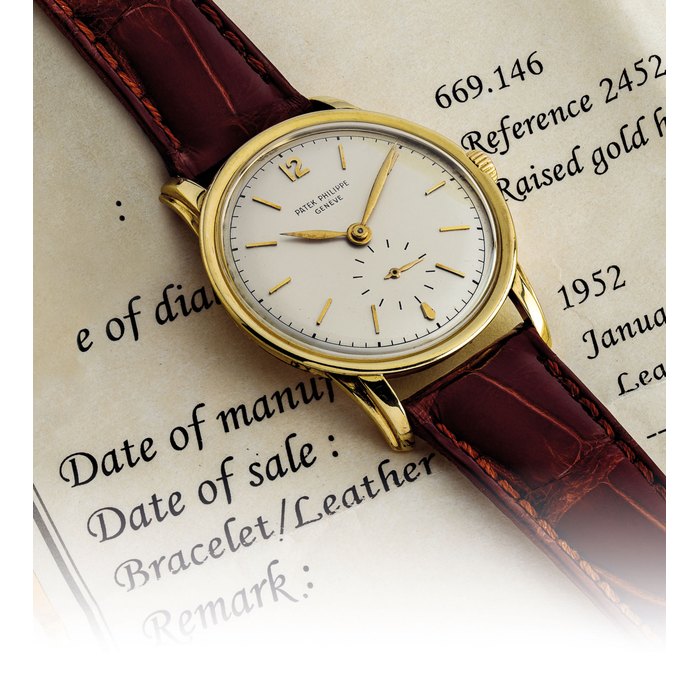 PATEK PHILIPPE. A RARE AND ATTRACTIVE 18K GOLD WRISTWATCH SIGNED PATEK PHILIPPE GENEVE, REF. 2452, MOVEMENT NO. 958’586, CASE NO. 669’146, MANUFACTURED IN 1952