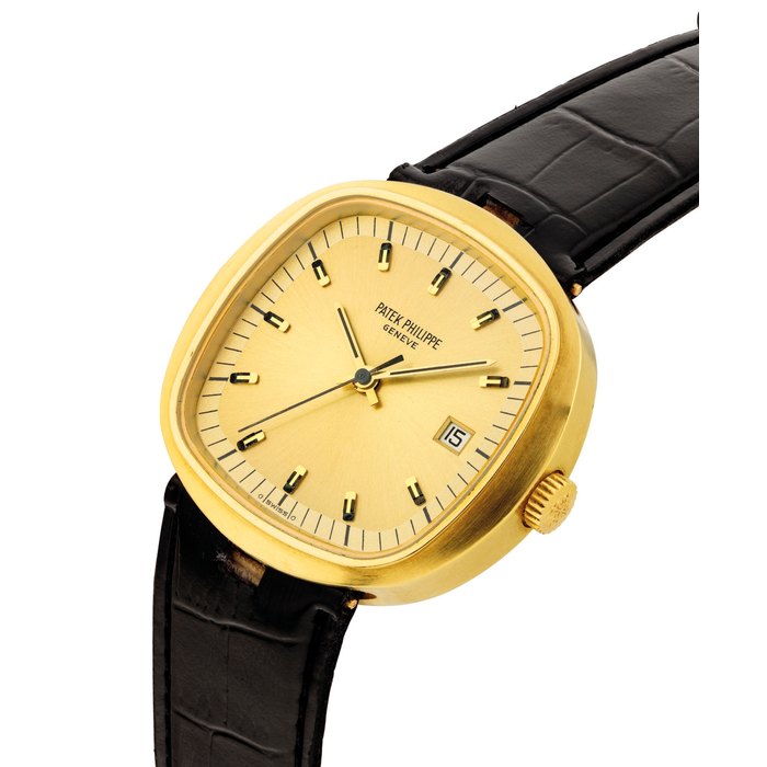 PATEK PHILIPPE. A RARE OVERSIZED 18K GOLD CUSHION-SHAPED ELECTRONIC WRISTWATCH WITH SWEEP CENTRE SECONDS, DATE AND TWO-TONE GILT DIAL SIGNED PATEK PHILIPPE, GENEVE, REF. 3597/2, MOVEMENT NO. 6118, CASE NO. 2'720'578, MANUFACTURED IN 1973