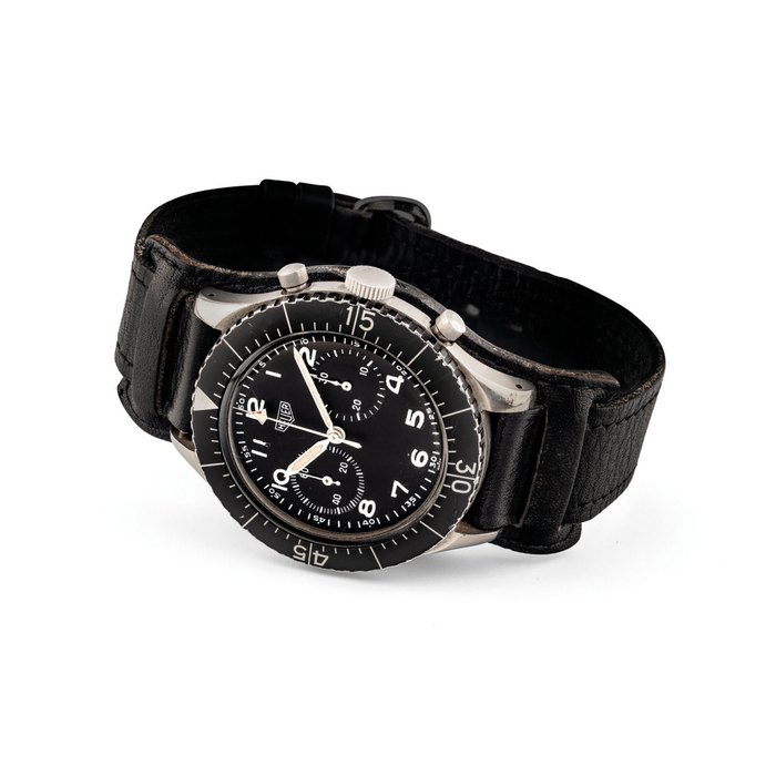 Heuer HEUER. A FINE STAINLESS STEEL MILITARY FLYBACK CHRONOGRAPH WRISTWATCH SIGNED HEUER, BUDESWEHR MODEL, REF. 1550 SG, CASE NO. 6368, ISSUE NO. 6645-12-146-3774, CIRCA 1970, Price & Market Data