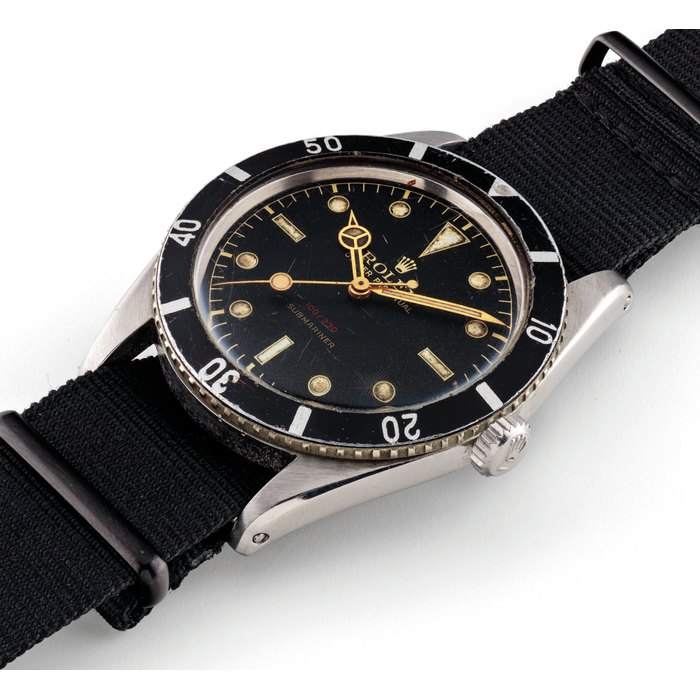 ROLEX. A RARE STAINLESS STEEL AUTOMATIC WRISTWATCH WITH SWEEP CENTRE SECONDS AND RED DEPTH RATING SIGNED ROLEX, SUMBARINER, RED DEPTH MODEL, REF. 6536, CASE NO. 112’122, CIRCA 1955