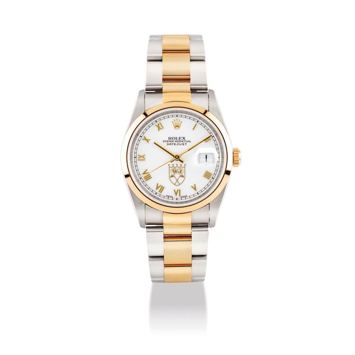 ROLEX. A FINE AND VERY RARE 18K GOLD AND STAINLESS STEEL LIMITED EDITION AUTOMATIC WRISTWATCH WITH SWEEP CENTRE SECONDS, DATE AND BRACELET TO COMMEMERATE THE SUCCESS OF GOLFER NICK PRICE SIGNED ROLEX, DATEJUST, NO. 39/200, REF. 16203, CASE NO. T705960, CIRCA 1997