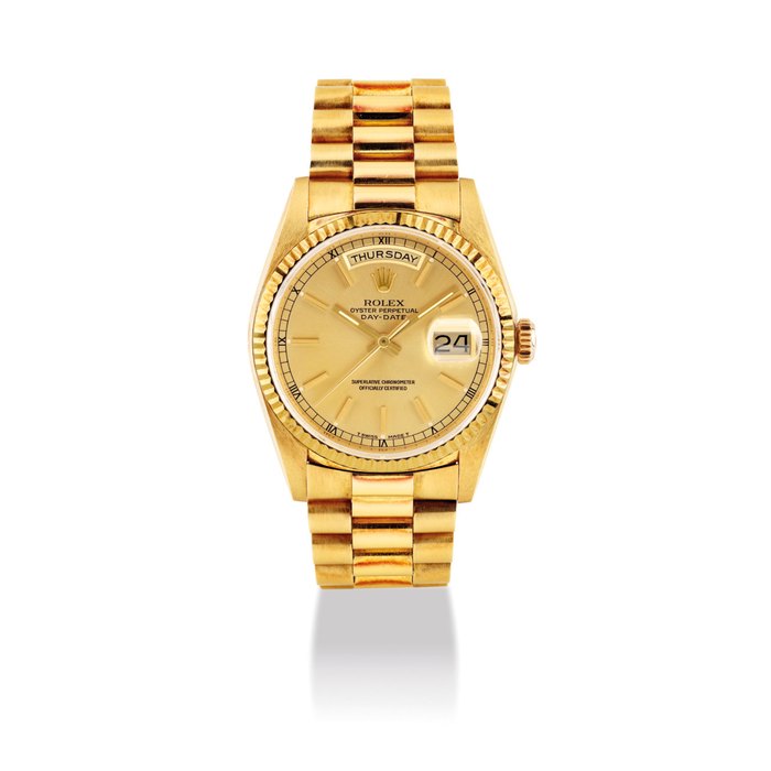 ROLEX. AN 18K GOLD AUTOMATIC WRISTWATCH WITH SWEEP CENTRE SECONDS, DAY, DATE AND BRACELET SIGNED ROLEX, DAY-DATE, REF. 18238, CASE NO. R690693, CIRCA 1988