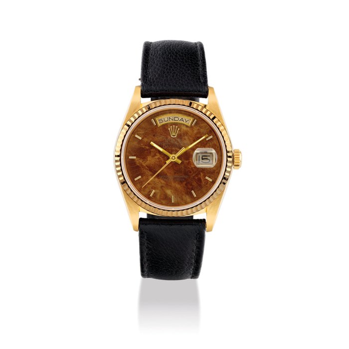 ROLEX. A RARE AND ATTRACTIVE 18K GOLD AUTOMATIC WRISTWATCH WITH DAY, DATE AND WOOD DIAL SIGNED ROLEX, OYSTER PERPETUAL, DAY-DATE, REF. 18038, CASE NO. 8’813’376, CIRCA 1985