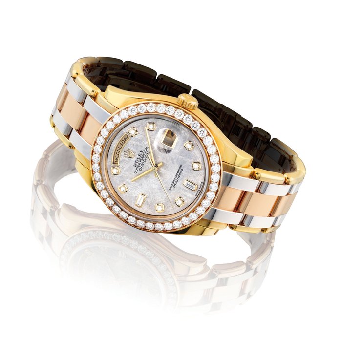 ROLEX. A FINE 18K THREE-COLOUR GOLD AND DIAMOND-SET AUTOMATIC WRISTWATCH WITH SWEEP CENTRE SECONDS, DAY, DATE, BRACELET AND METEORITE DIAL SIGNED ROLEX, OYSTER PERPETUAL, DAY-DATE PEARLMASTER MODEL, REF. 18948, CASE NO. W082215, CIRCA 1995