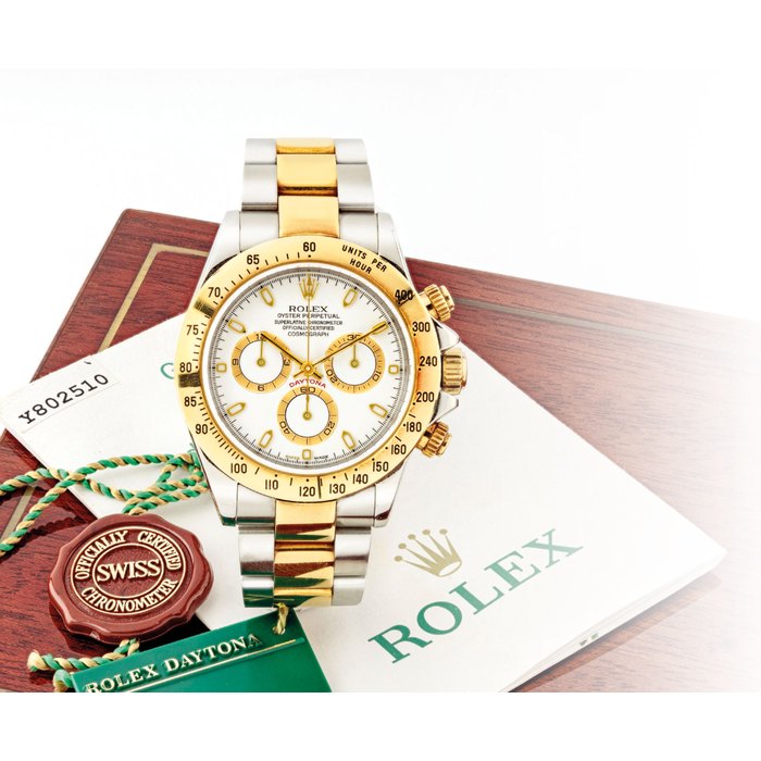 ROLEX. A STAINLESS STEEL AND GOLD AUTOMATIC CHRONOGRAPH WRISTWATCH WITH BRACELET SIGNED ROLEX, COSMOGRAPH DAYTONA MODEL, REF. 116523, CASE NO. Y802510, CIRCA 2003