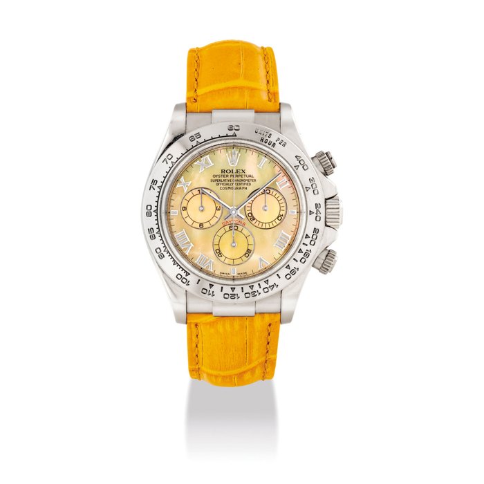 ROLEX. A FINE 18K WHITE GOLD AUTOMATIC CHRONOGRAPH WRISTWATCH WITH YELLOW MOTHER-OF-PEARL DIAL SIGNED ROLEX, OYSTER PERPETUAL, COSMOGRAPH, DAYTONA BEACH MODEL, REF. 116519, CASE NO. K123137, CIRCA 2001