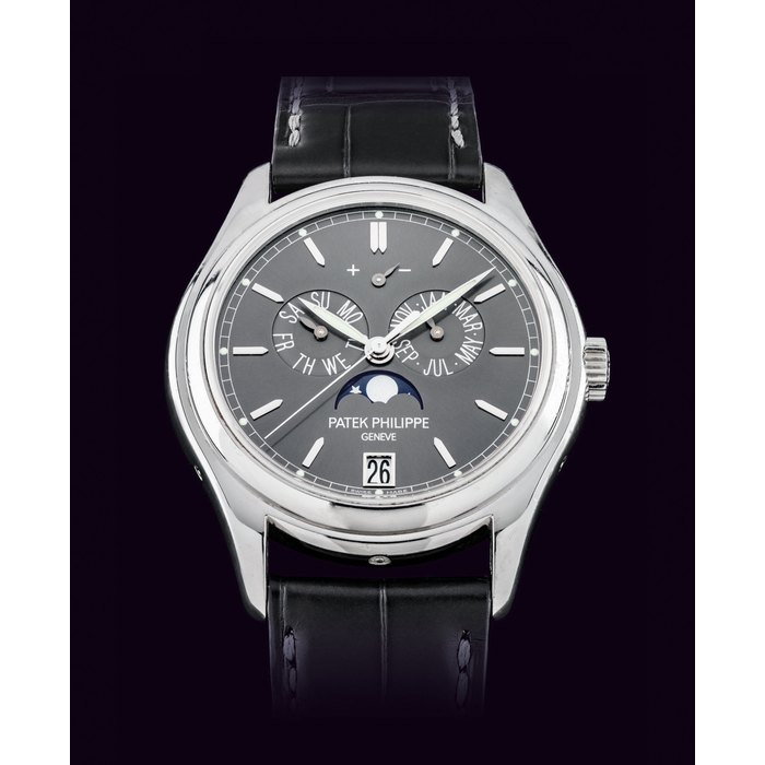 PATEK PHILIPPE. A FINE PLATINUM AUTOMATIC ANNUAL CALENDAR WRISTWATCH WITH SWEEP CENTRE SECONDS, POWER RESERVE AND MOON PHASES SIGNED PATEK PHILIPPE, GENEVE, REF. 5146, MOVEMENT NO. 3'804'676, CASE NO. 4'720'766, CIRCA 2009