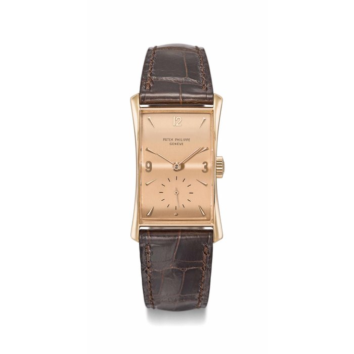 Patek Philippe. A fine and rare 18K pink gold rectangular curved wristwatch with pink dial Signed Patek Philippe, Genève, ref. 1593, movement no. 837'318, case no. 637'094, manufactured in 1945