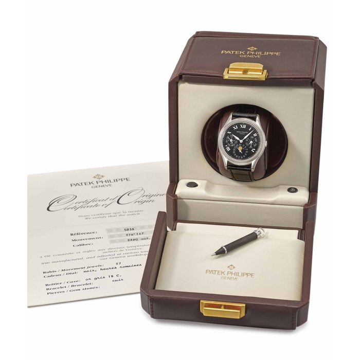 Patek Philippe. A fine and rare 18K white gold limited series automatic perpetual calendar wristwatch with moon phase, certificate of origin and winding box Signed Patek Philippe, Genève, ref. 5038, movement no. 776'167, case no. 4'006'339, circa 1996