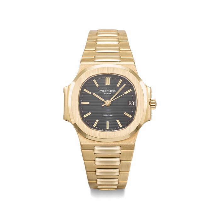 Patek Philippe. A fine and extremely rare 18K gold automatic wristwatch with date, sweep centre seconds and bracelet Signed Patek Philippe, Genève, retailed by Gübelin, Nautilus model, ref. 3800/1, movement no. 1’425’881, case no. 2’831’602, manufactured in 1987